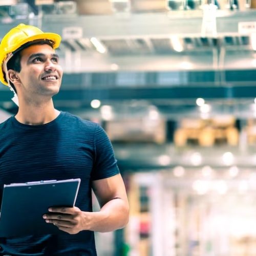 smart-indian-engineer-man-wearing-safety-helmet-doing-stock-tick-check-cardboard-stock-product-manag